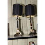 Pair of silver coloured decorative tables lamps with shades, 64cm.