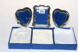 Pair of heart shaped photograph frames and another, boxed (3).
