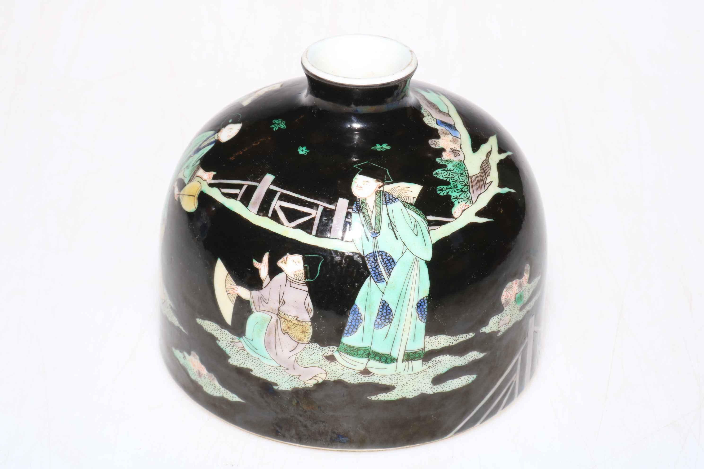 Chinese squat brush washer decorated with figures in garden on black ground,