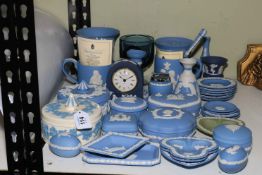 Collection of Wedgwood Blue Jasperware including trinket boxes, clock, pin dishes, etc.