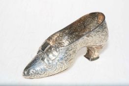 19th Century heavily embossed silver shoe,