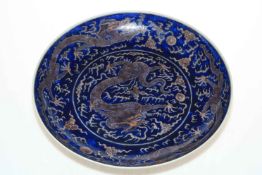 Large Chinese charger decorated with dragon design, 41.5cm diameter.