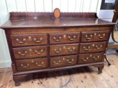 Antique oak and mahogany crossbanded nine drawer Lancashire mule chest, 124cm by 157cm by 56cm.