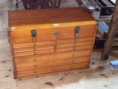 Clarke nine drawer tool chest containing a collection of tools including chisels, planes,