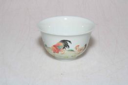 Small Chinese tea cup decorated with chickens and famille rose, 8.5cm diameter.