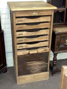 Early 20th Century oak tambour front filing cabinet, 111cm by 55cm by 54cm.