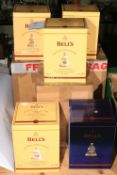 Five limited edition Bell's whisky decanters including Christmas 2004 to 2008, in boxes.