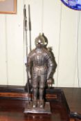Cast metal knight fire guard, 74cm high.
