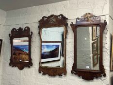 Three Georgian style fretwork mirrors.