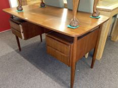 Vintage Danish teak Tibergaard four drawer desk, 72.5cm by 129.5cm, 68cm.