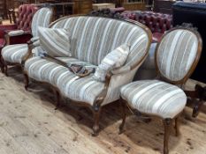 Victorian French rosewood three piece suite comprising double serpentine front settee,