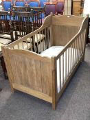 Early 20th Century oak child's cot complete.