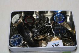 Collection of assorted wristwatches and bracelet.