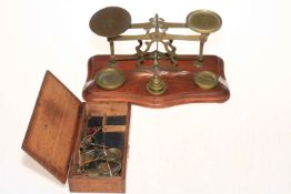 Set of vintage Post Office scales and weights and Apothecary scale and weights.