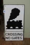 Cast iron 'Crossing' railway sign, 59cm high.
