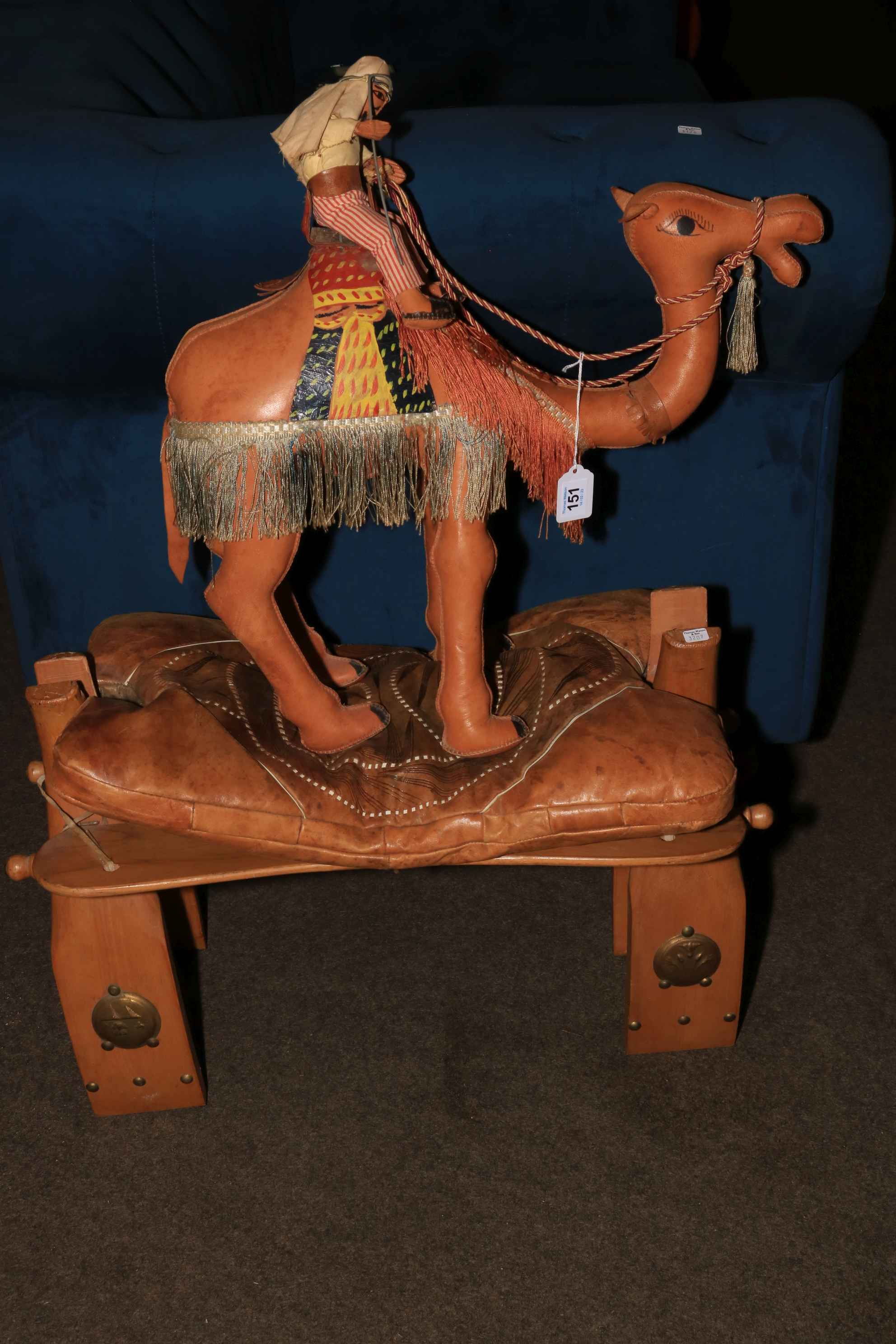 Leather camel and camel stool.