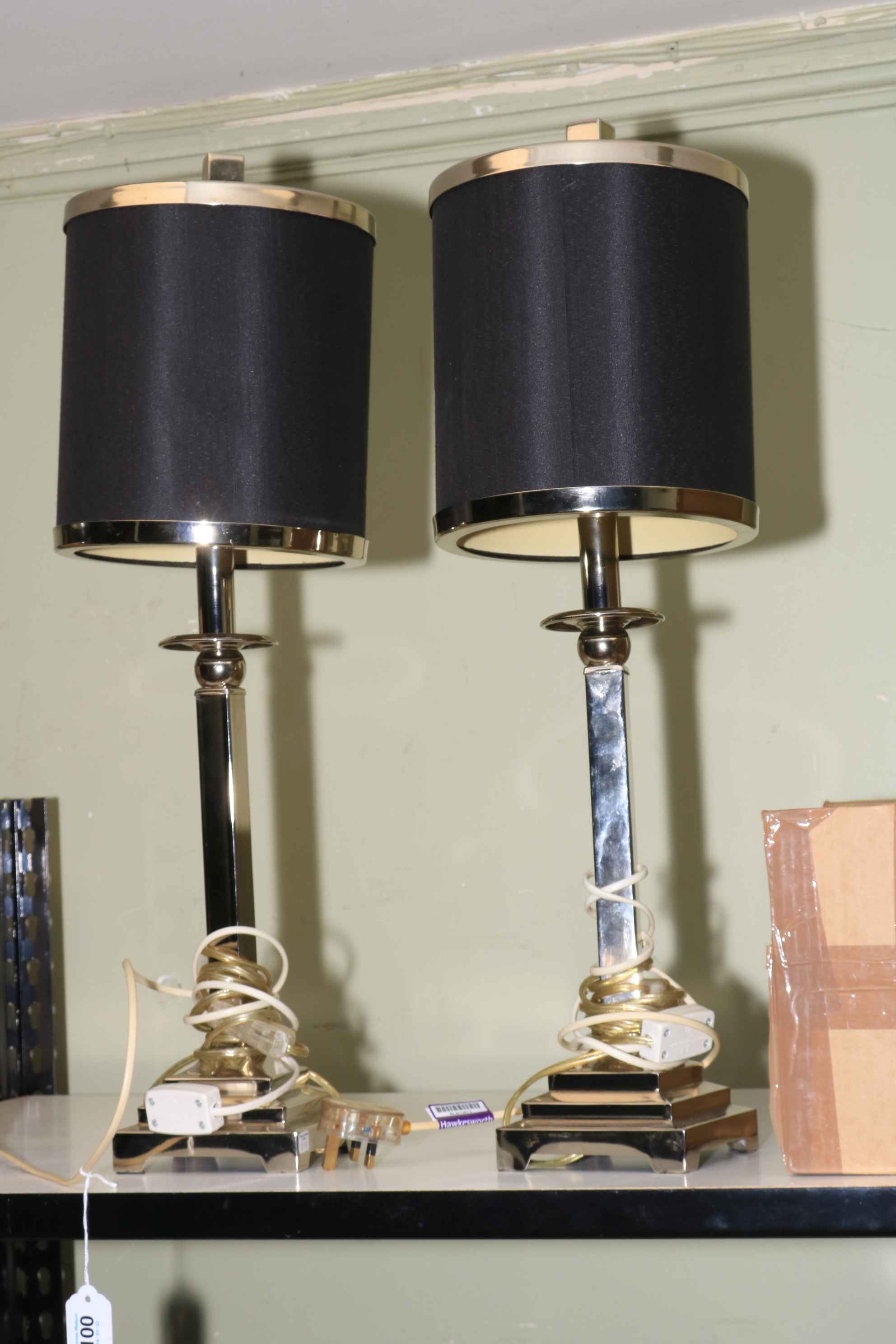 Pair of silver coloured decorative tables lamps with shades, 64cm.