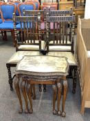 Set of four oak bobbin leg dining chairs and nest of three walnut tables on ball and claw legs.