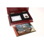 El Cazador 8 Reales silver coin by The Morgan Mint with NGC Shipwreck certification and box.