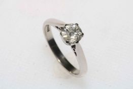18 carat white gold and diamond solitaire ring, the 63 point diamond colour H and clarity Si1,