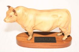 Small Beswick Charolais Bull on plinth, 14cm high.