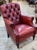 Laura Ashley red buttoned leather armchair.