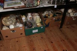 Four boxes of decorative pottery, glass, etc.