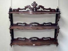 Victorian rosewood open three tier wall shelf, 69cm by 75cm.