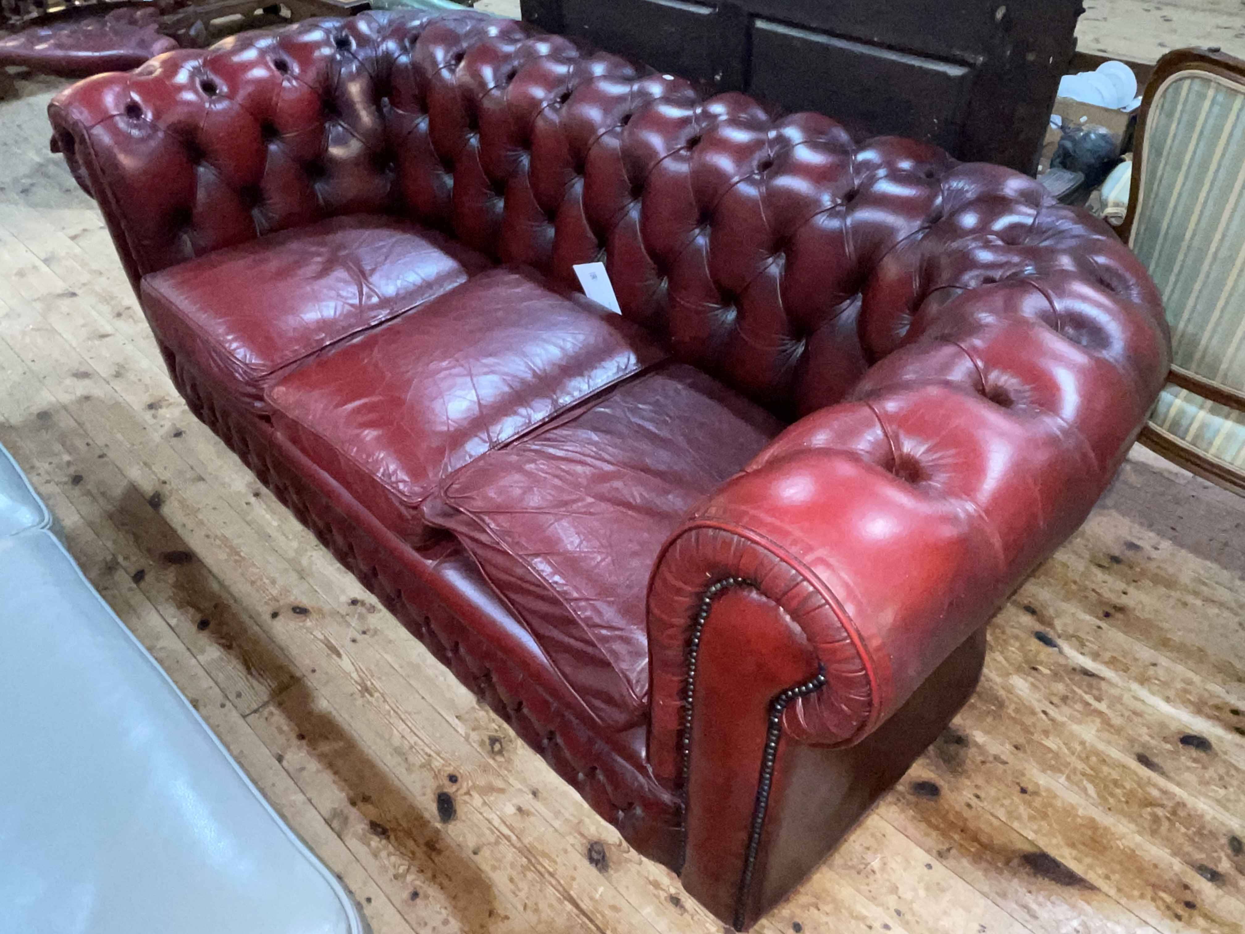 Ox blood buttoned leather three seater Chesterfield settee. - Image 2 of 2