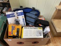 Box of various cameras and accessories.