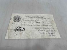 A Bank of England white five pounds banknote, 9 February 1952, P S Beale, serial W98 054821.