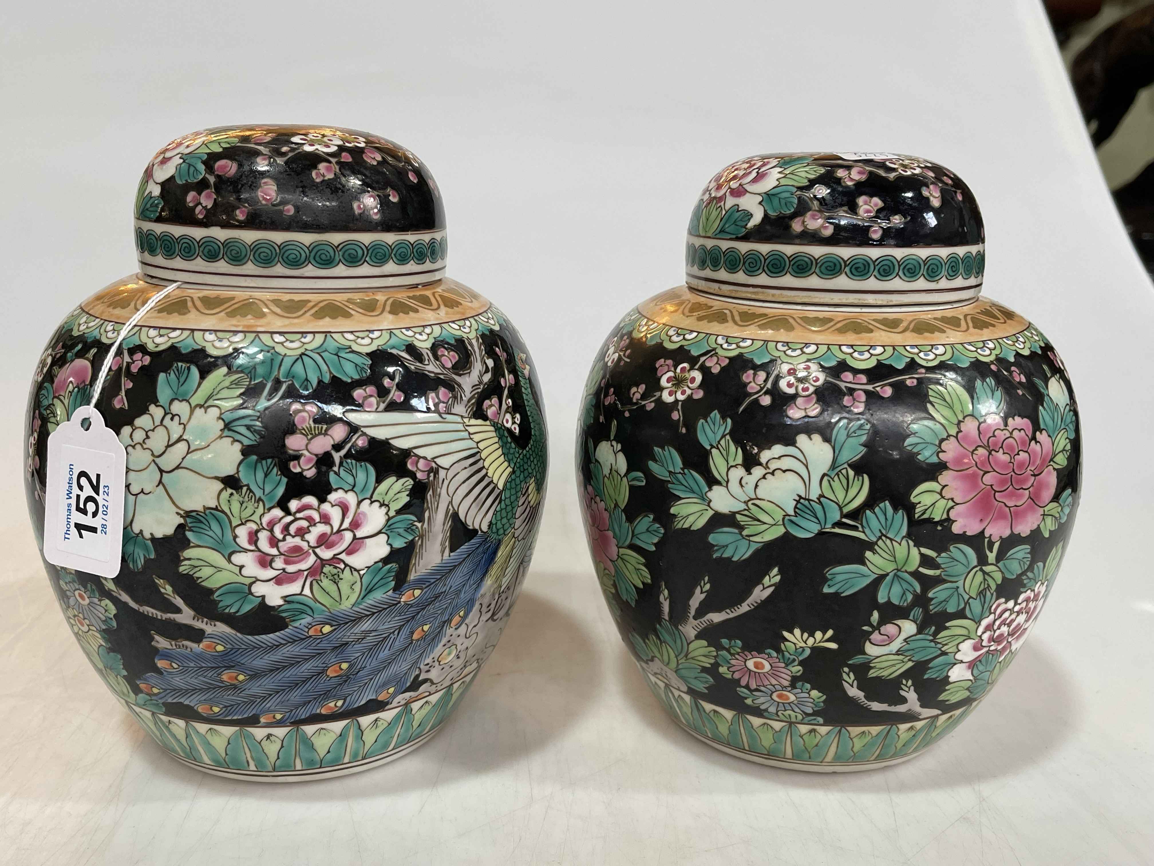 Pair Chinese ginger jars and covers, 21cm.
