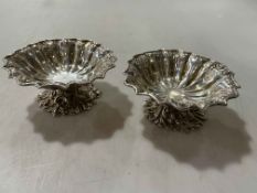 Pair Victorian silver pedestal salts having fluted bowls and on ornate cast foot, London 1852,