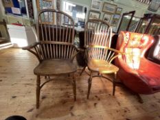 Pair Windsor spindle back elbow chairs with crinoline stretchers.