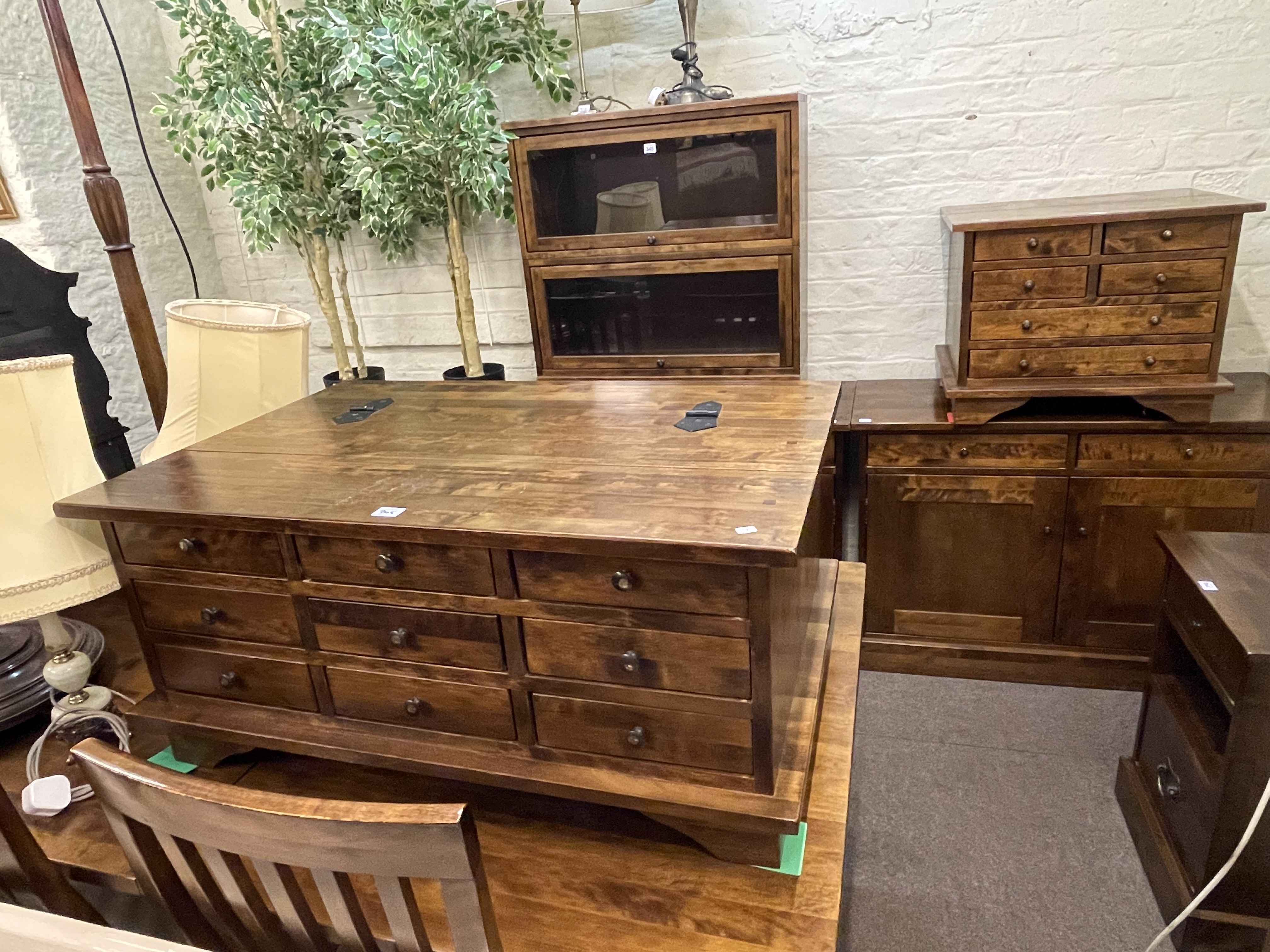 Laura Ashley two height glazed door bookcase, nine drawer low storage table,