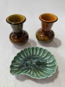Two Linthorpe vases, no. 2171, 13cm, and fluted dish, no. 447, 17cm across (3).