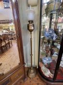 Late 19th/Early 20th Century brass telescopic standard oil lamp with vaseline glass shade.