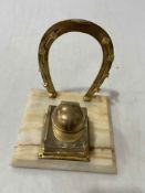 Gilt jockey cap and horseshoe inkstand, 15cm across.