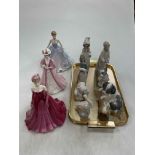 Six Lladro pieces, Nao puppies, and three boxed Coalport ladies.