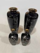 Two pair of Cloisonné vases with bird and blossom decoration on dark/black ground, tallest 24cm.