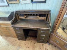 Early 20th Century Lebus oak double pedestal roll top desk, 119cm by 121cm by 68cm.