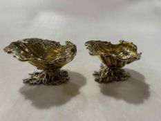 Pair of CJ Vander good quality silver gilt shell shaped salts having chased borders and cast foot,