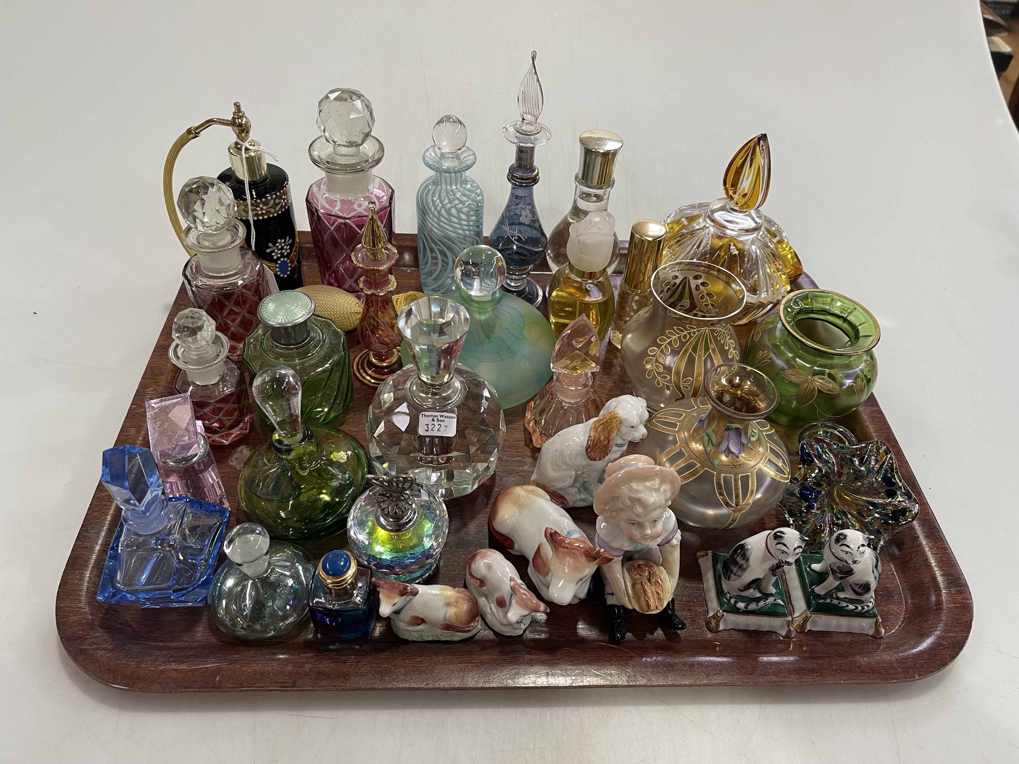 Tray lot with scent bottles, animal figures, etc.