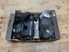 Box of various cameras and accessories.