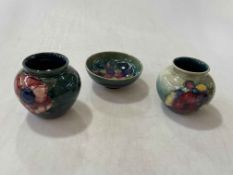 Two Moorcroft vases, orchid and anemone, 6.5cm, and columbine pedestal bowl (3).