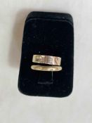 Two 9 carat gold wedding band rings.