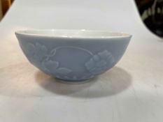Chinese porcelain blue glaze flower relief bowl, six character mark, 13cm diameter.