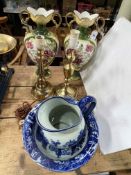 Two brass table lamps, blue and white wash bowl and jug, and pair floral vases.