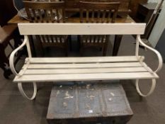 Painted wrought metal and wood slat scroll arm garden bench, 151cm in length.