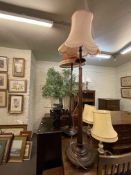 Two turned column standard lamps and shades, four table lamps and two artificial plants (8).